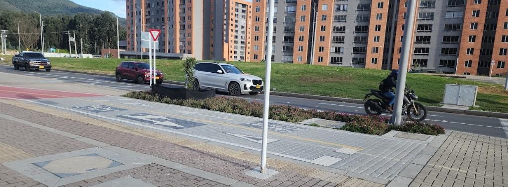 Guaymaral Calle 235 — instalación de adoquines y losetas guía
